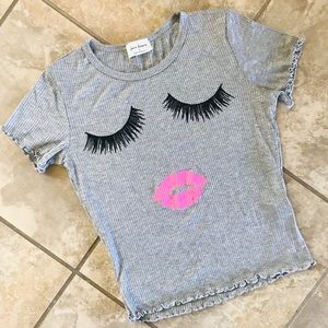Free Kisses | Eye Lash Face Ribbed T-Shirt